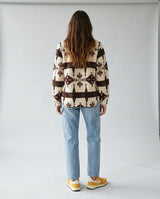 Women's Ainsley Sherpa Pullover by LIV Outdoor, cozy fleece-lined top with a relaxed fit and stand collar, perfect for outdoor wear.