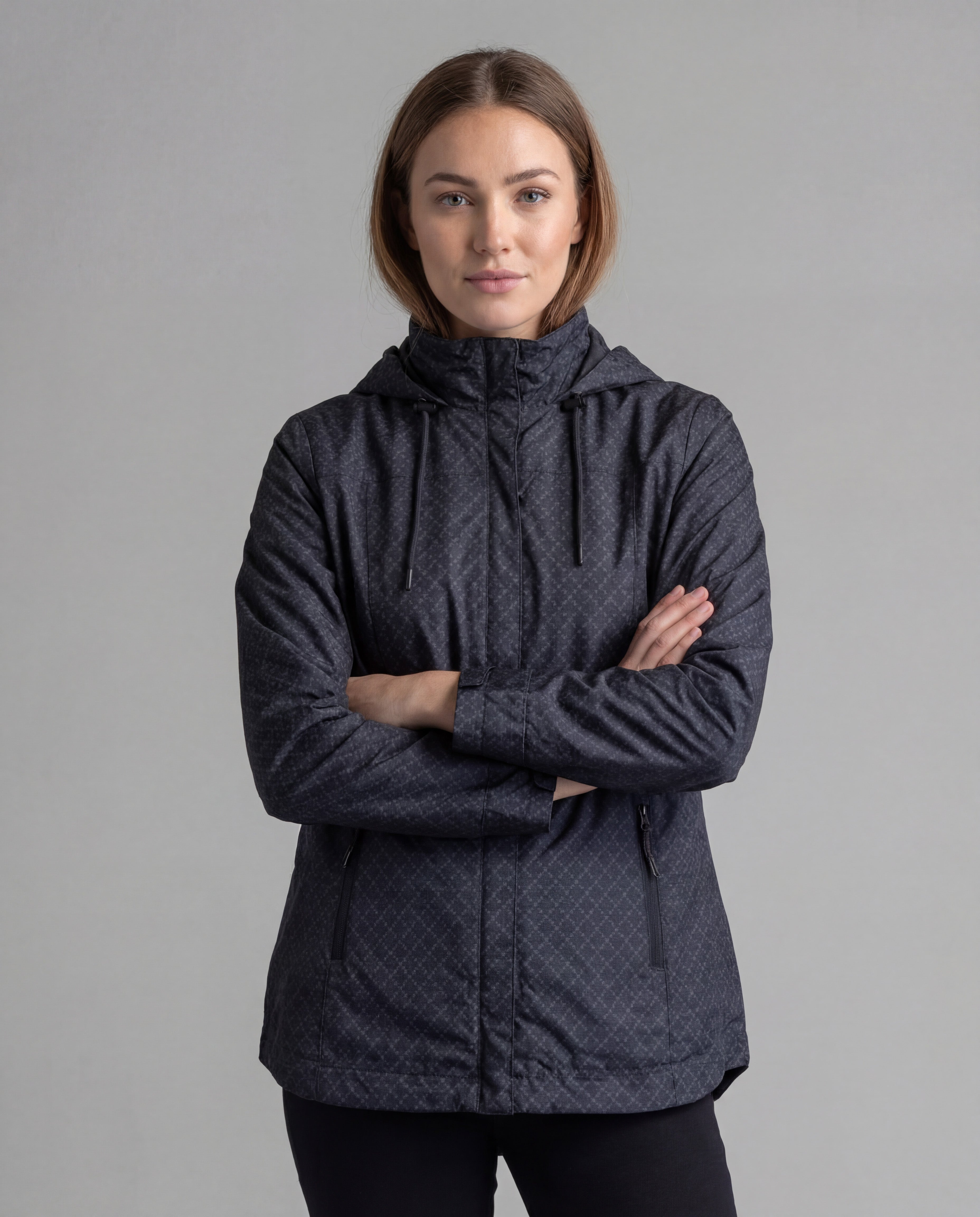 Black women's LIV Outdoor Savannah fleece-lined rainshell jacket, front view showing waterproof fabric and cozy lining.