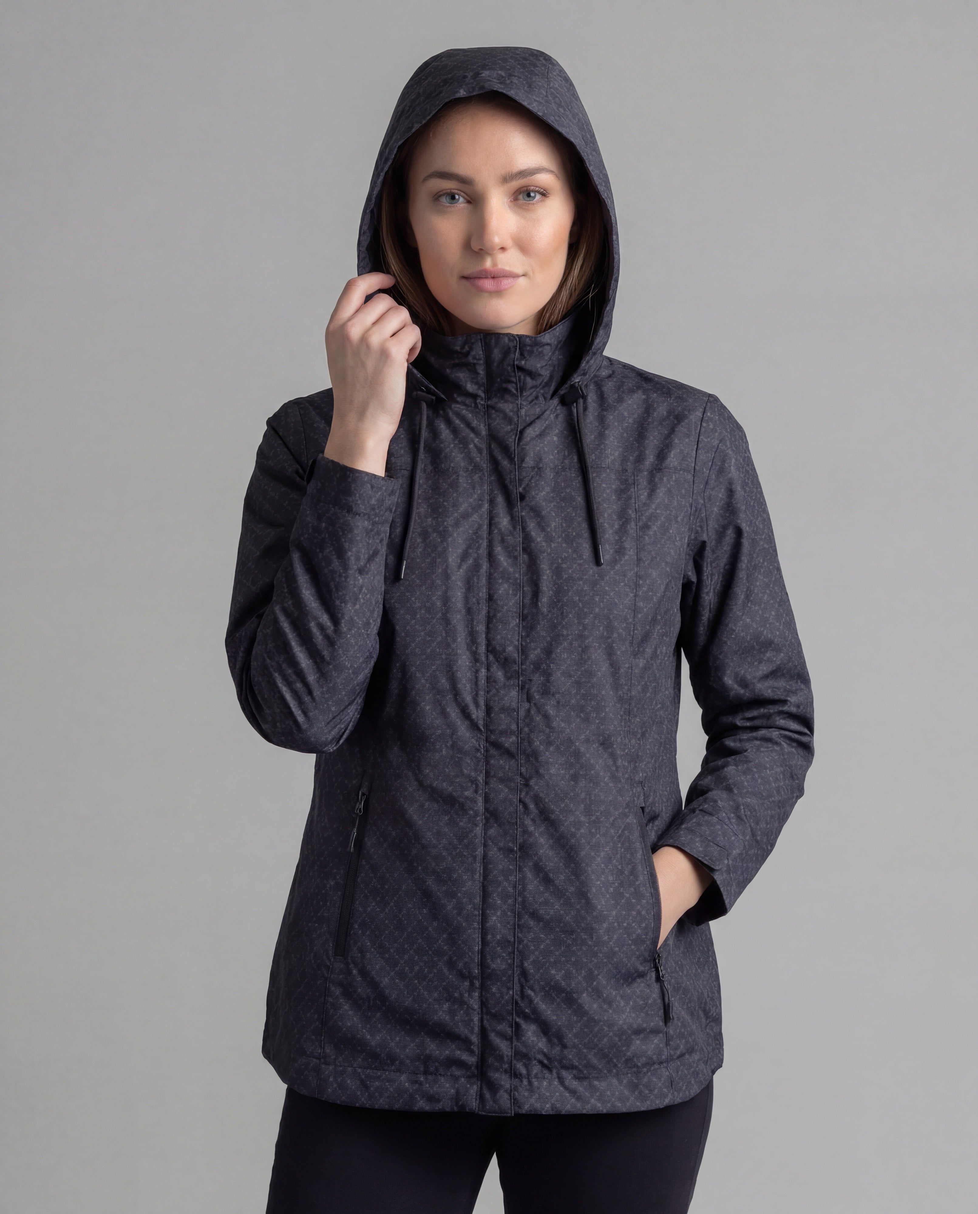 Black women's LIV Outdoor Savannah fleece-lined rainshell jacket with front view, showcasing its rain-resistant material and cozy fleece interior.