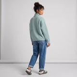 Women's LIV Outdoor Kaya quilted pullover in aqua grey, featuring a quarter-zip style, displayed on a neutral studio background.