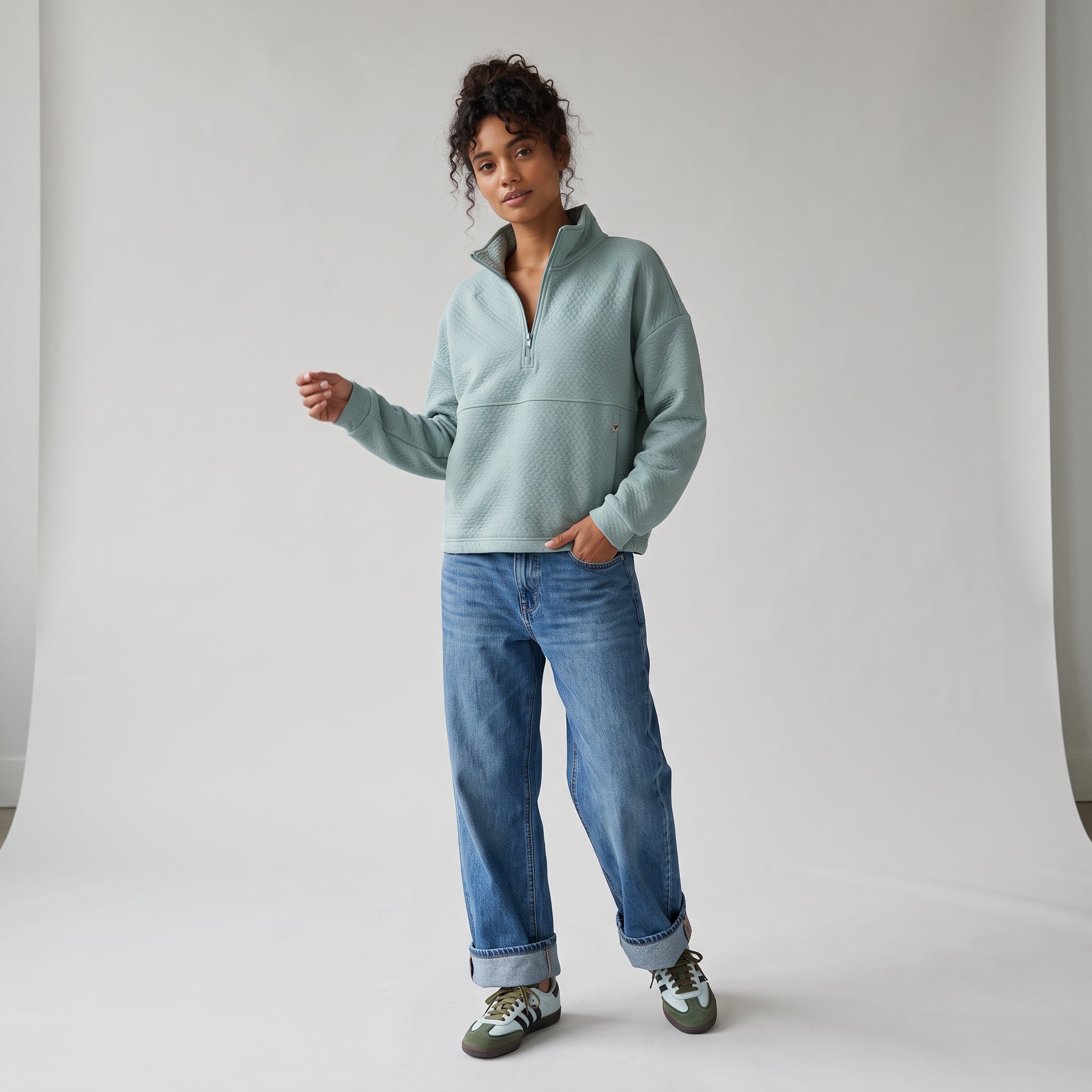 Women's LIV Outdoor Kaya quilted pullover in Aqua Grey, featuring a quarter-zip design and cozy, stylish top for women.