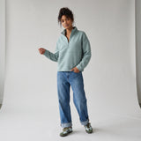 Women's LIV Outdoor Kaya quilted pullover in Aqua Grey, featuring a quarter-zip design and cozy, stylish top for women.