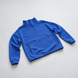 Women's LIV Outdoor Kaya quilted pullover in cerulean blue, featuring a quarter-zip and cozy quilted design.