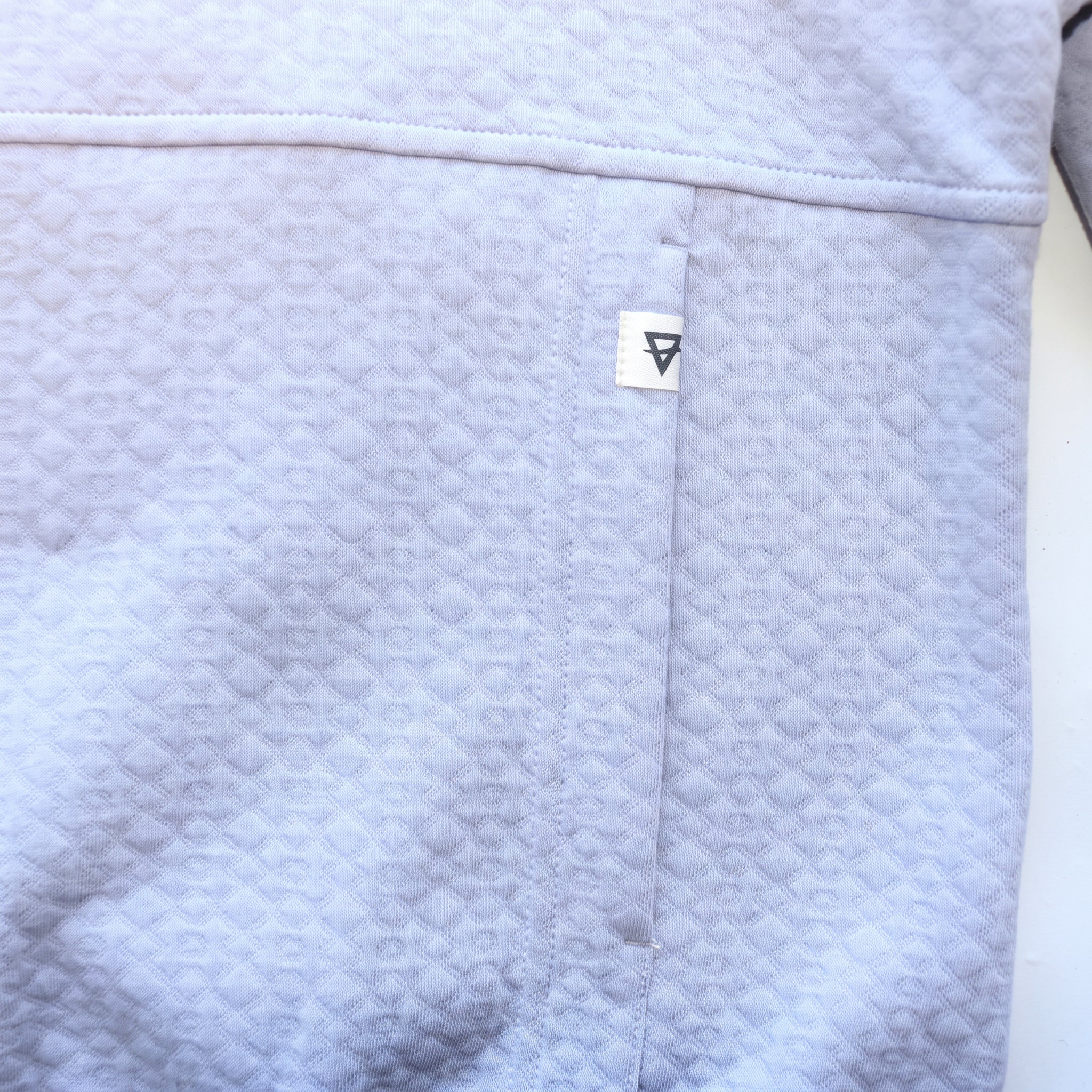 Women's LIV Outdoor Kaya quilted pullover with quarter zip in Icelandic Blue, showcasing soft fabric and quilted design.
