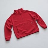 Women's LIV Outdoor Kaya quilted pullover with quarter zip in vibrant scarlet, showcased on a flat front view.