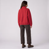 Women's LIV Outdoor Kaya quilted pullover with a quarter-zip and vibrant scarlet color, displayed on a studio background.