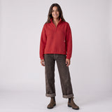 Women's LIV Outdoor Kaya quilted pullover with quarter zip in scarlet, shown on a model. Stylish women's top for outdoor wear.