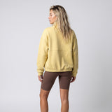 Women's LIV Outdoor Kaya quilted pullover with quarter zip, soft fabric, and stylish design, perfect for casual wear.