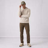 Men's LIV Outdoor Lichen stretch flannel hooded Henley top with a relaxed fit, soft fabric, and buttoned neckline.