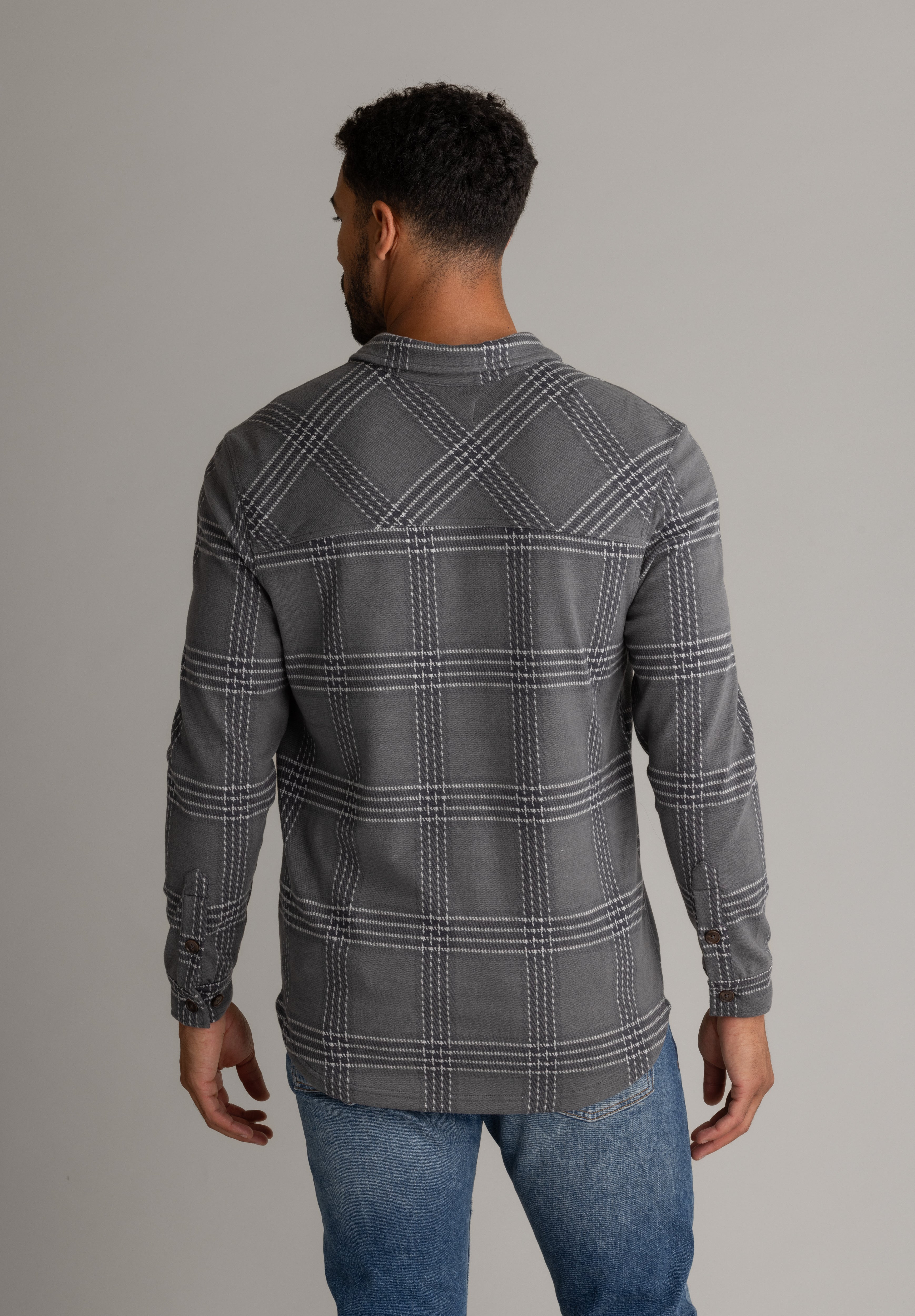 Men's LIV Outdoor Lichen Stretch Flannel button-down top, shown in a casual, comfortable fit with a classic plaid pattern.