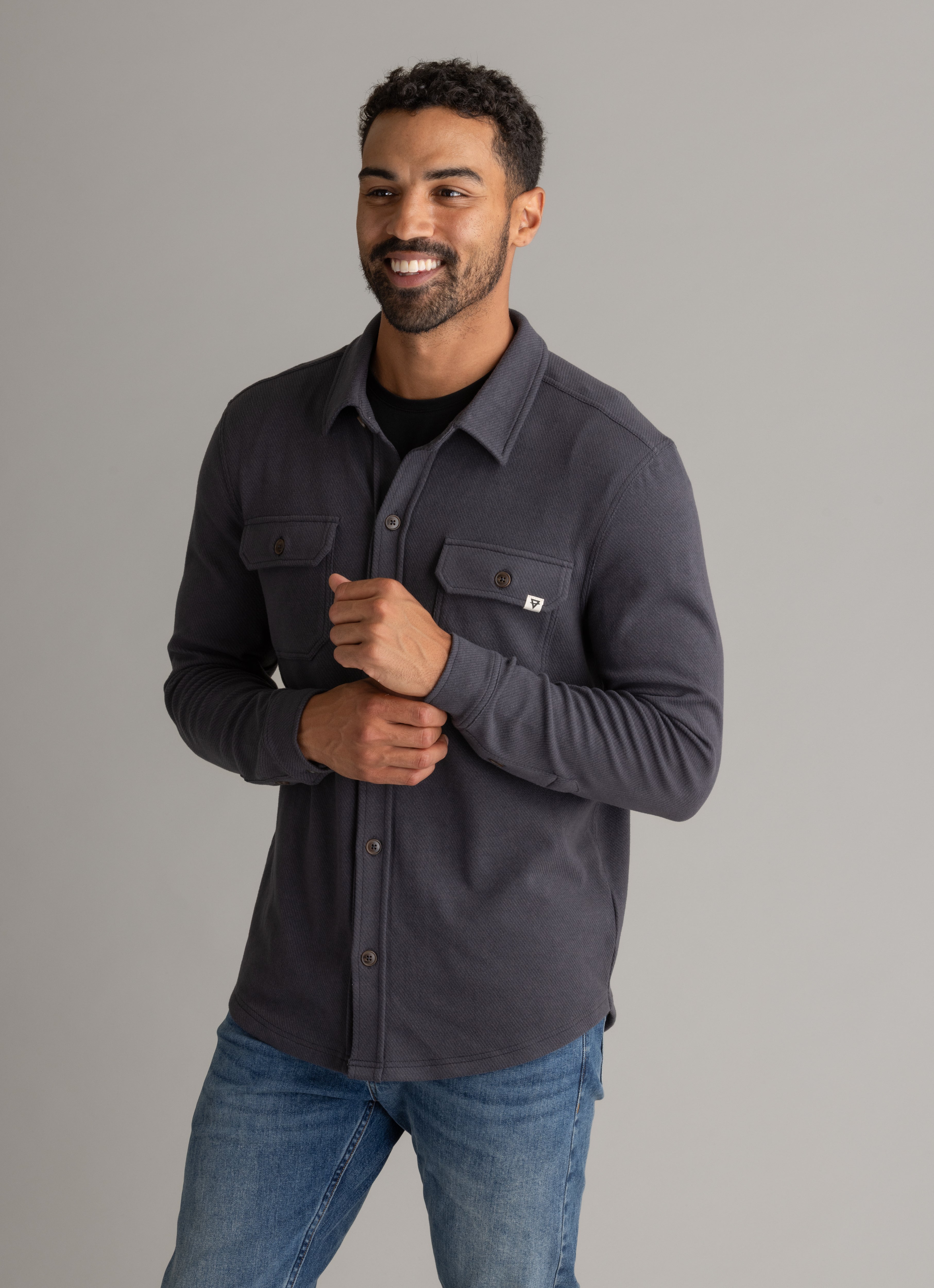Men's LIV Outdoor Lichen Stretch Flannel button-down top in black, featuring a classic collar and button front.