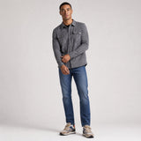 LIV Outdoor men's stretch flannel button-down shirt in lichen with a classic checkered pattern and relaxed fit.