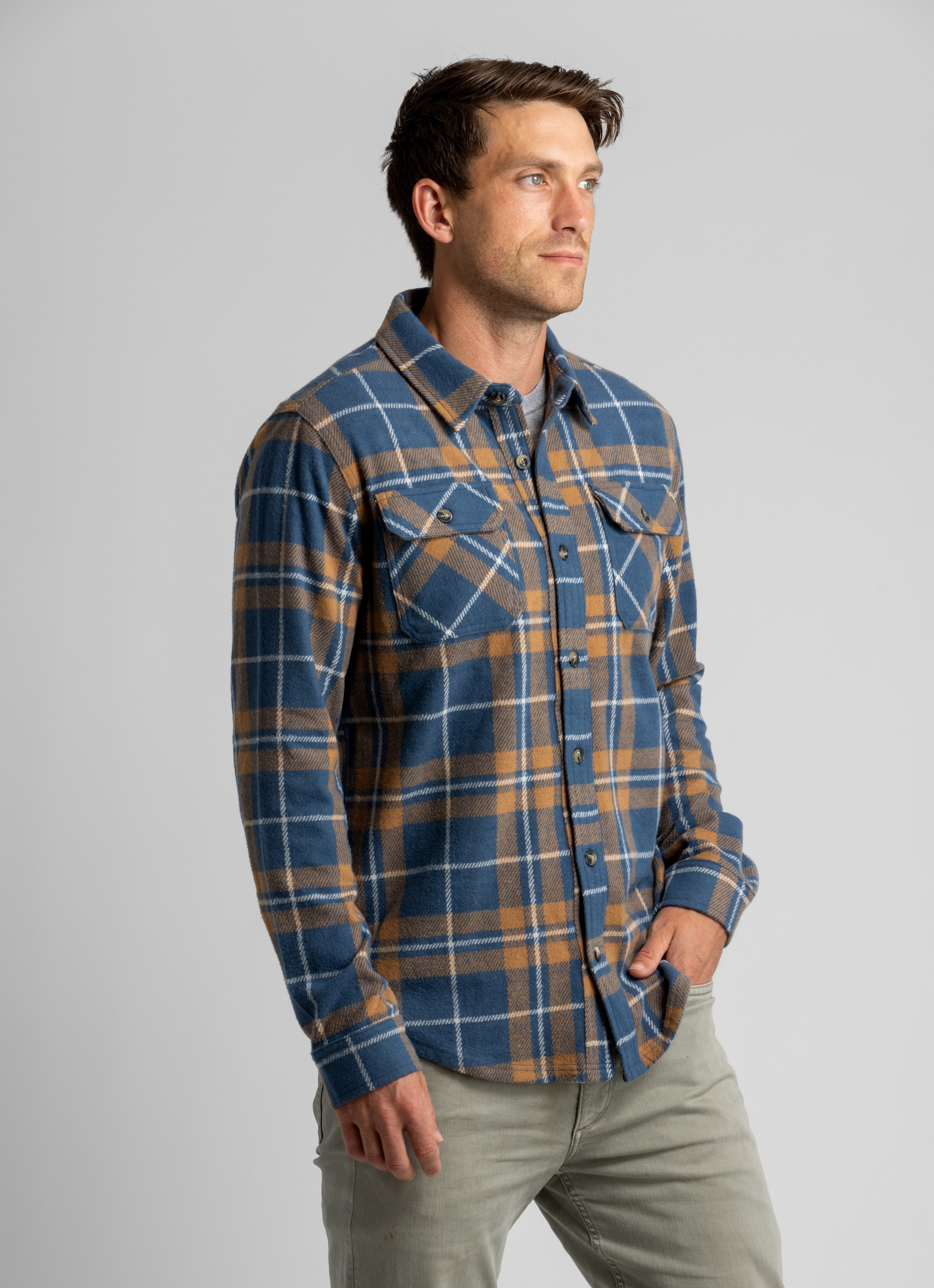 Men's LIV Outdoor Lichen Stretch Flannel Button Down shirt, shown in a casual men's top style with a button-up front and plaid pattern.