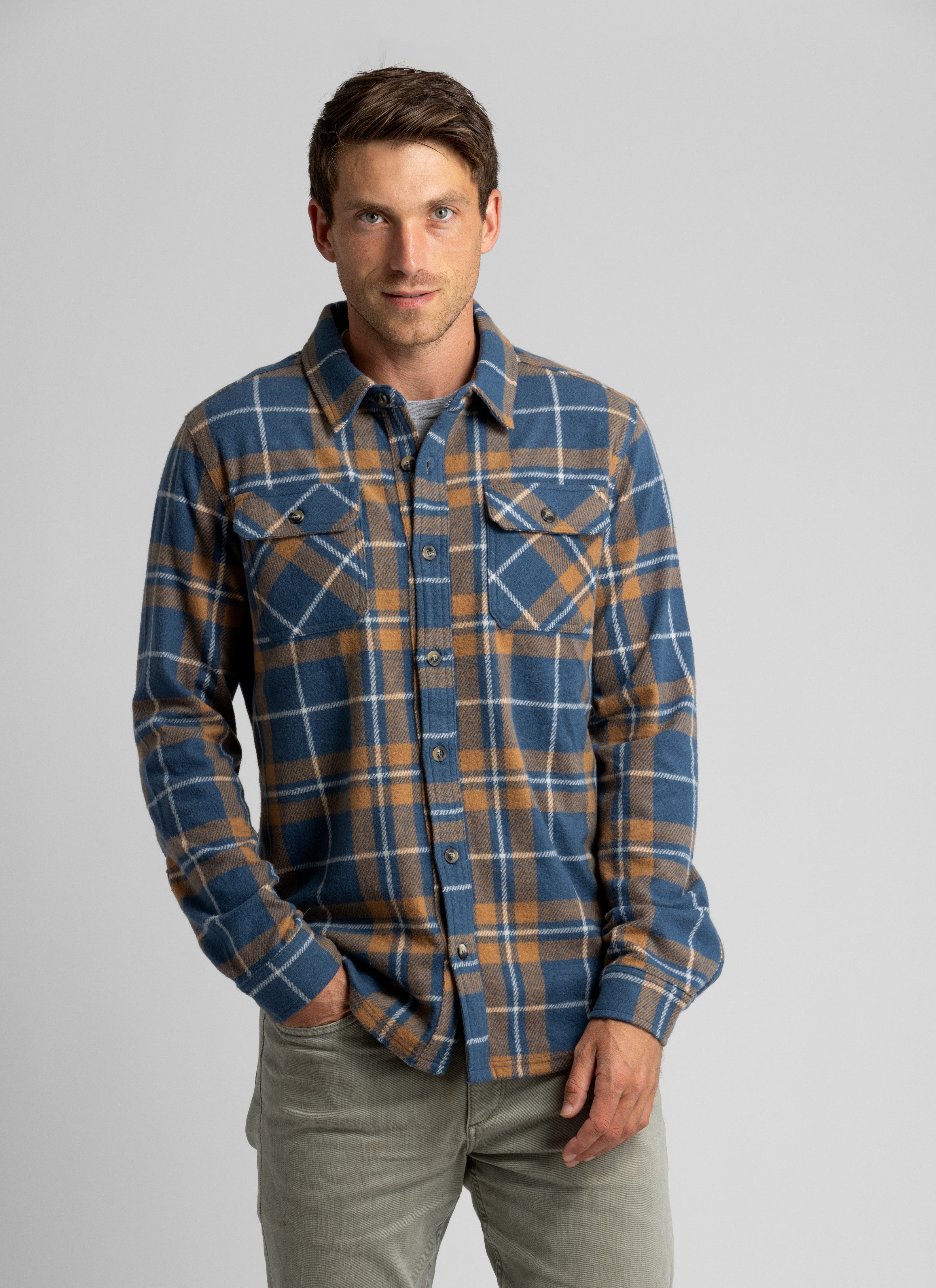 Men's LIV Outdoor Lichen Stretch Flannel button-down shirt, shown in a relaxed fit with a classic collar and plaid pattern.